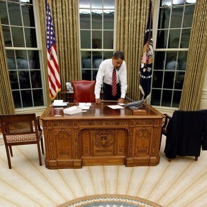 Barack Obama behind Resolute Desk in the Oval Office - Public Domain